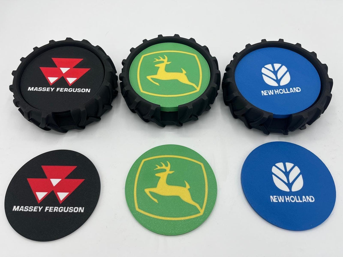 Six tractor-style coasters arranged on a white background, featuring Massey Ferguson, John Deere, and New Holland logos in black, green, and blue.